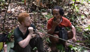 Jon learning how to use a blowpipe from Tok. He's pretty handy with one too. 